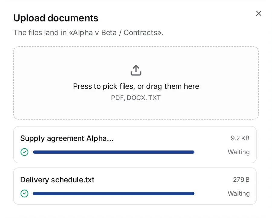 The Upload documents window: the line The files land in «Alpha v Beta / Contracts», the drop zone with Press to pick files, or drag them here and PDF, DOCX, TXT, and two files below it, Supply agreement Alpha-Beta.docx and Delivery schedule.txt, each with the status Waiting